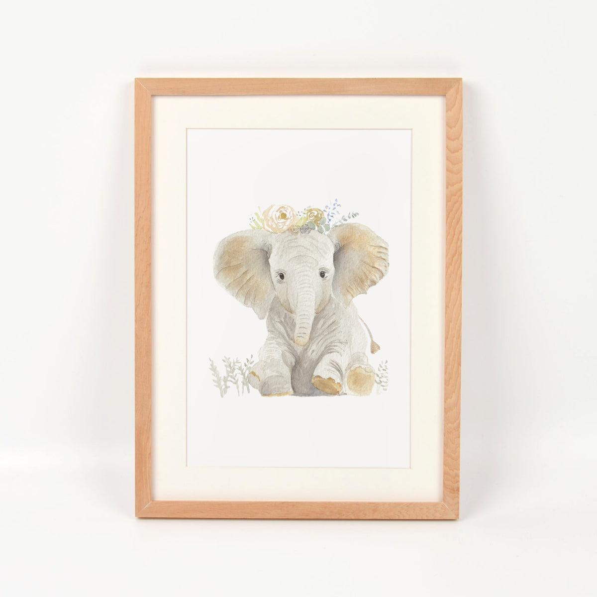Elefante con flores enmarcado en madera nativa